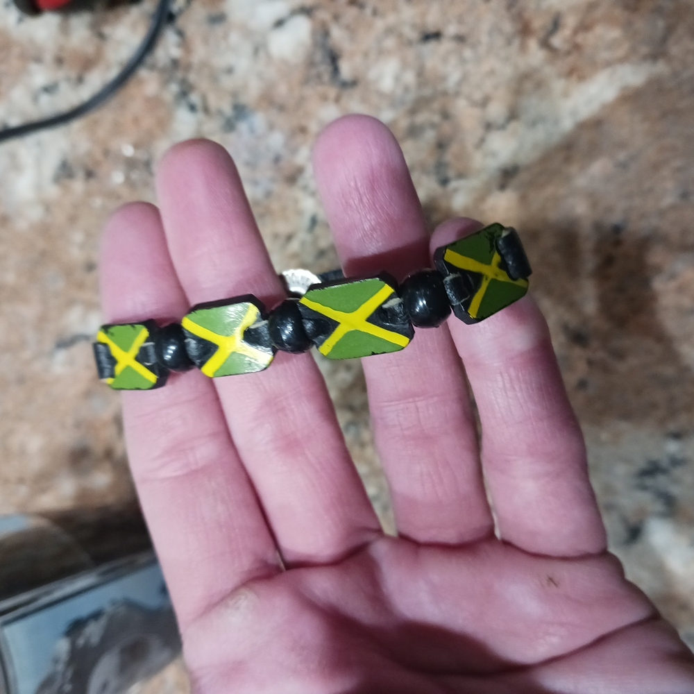 Jamaican Flag 7.5in Beaded Wooden Bracelet, Leather Strap.
